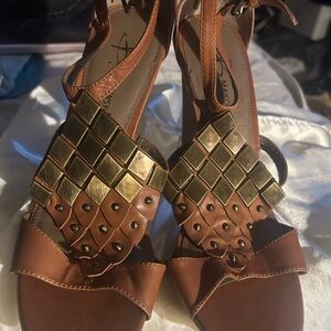 B. Makowsky Brown and Gold Heeled Sandals